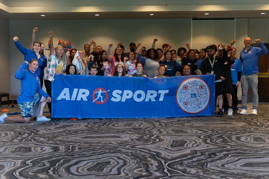A corporate group activation with the Air O Sport banner